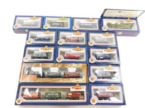 A Bachmann OO gauge V1/3 Class locomotive, LNER green livery, 2-6-2T, 7684, together with single and triple set plank wagons, boxed. (14)