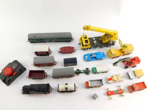 A Tri-ang OO guage diesel locomotive, British Rail green livery, D5572, R357., a tank locomotive, wagons and die cast Matchbox and Dinky lorries, etc. (1 tray)