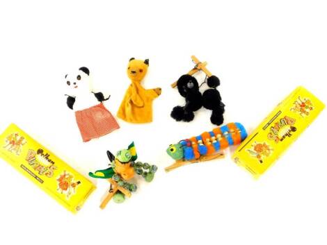 Two Pelham puppets, Baby Dragon and Caterpillar, boxed further puppet black poodle, together with Sooty & Sweep hand puppets. (5)