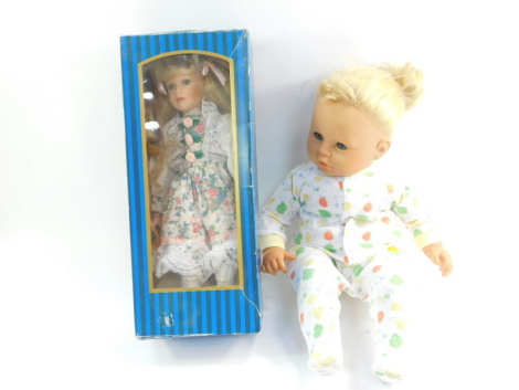 A Zapf Creation doll, serial no. 65-20, together with a collector's doll, boxed. (2)