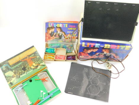 Hasbro Lite-Brite picture game, Hasbro Lite-Brite pegs and a Berwick blow football game. (3)