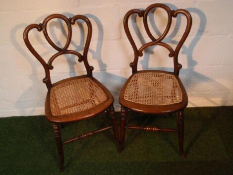 A pair of Victorian walnut bedroom chairs