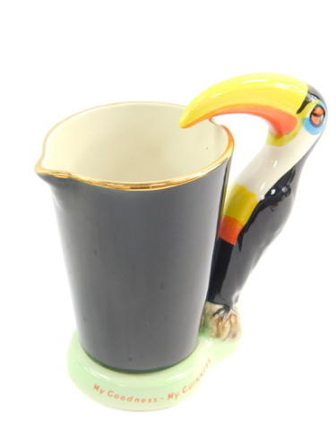 A Carltonware pottery My Goodness My Guiness jug, modelled with a toucan handle, printed mark, 18.5cm high.