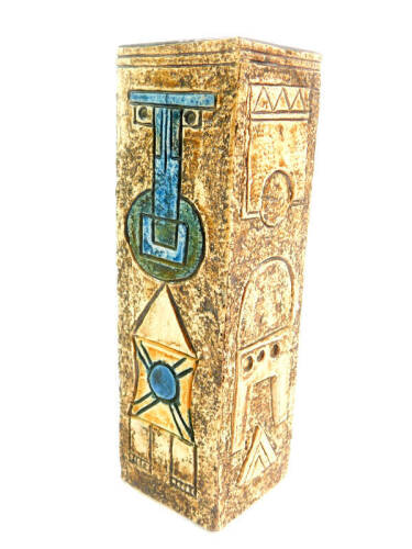 A Troika pottery vase, decorated by Avril Bennet, of rectangular section, carved and painted with geometric motifs, painted mark, 22cm high.