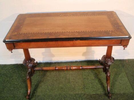 A Victorian walnut marquetry centre table