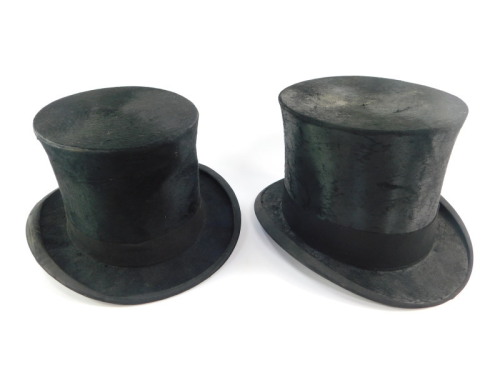 An A J White black top hat, aperture 6 1/2" wide, 7 3/4" deep, and a further top hat, unnamed, aperture 6 1/8" wide, 7 3/4" deep. (2)