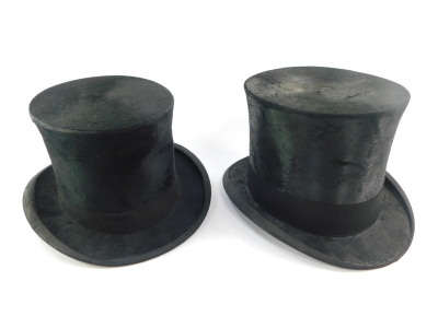 An A J White black top hat, aperture 6 1/2" wide, 7 3/4" deep, and a further top hat, unnamed, aperture 6 1/8" wide, 7 3/4" deep. (2)