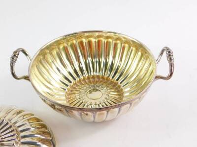 A George III silver twin handled porringer and cover, of fluted form, maker's initials T H, London 1804, 11.70oz. - 2