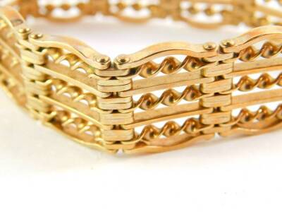 A 9ct gold six bar gate bracelet, on a heart shaped padlock clasp, with safety chain as fitted, 38.6g. - 2