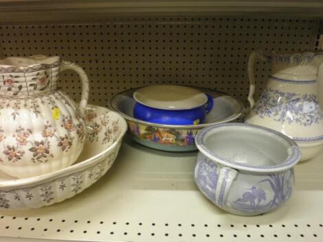 A Victorian chamber pot printed with a design of herons