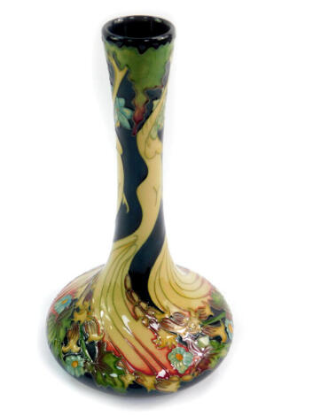 A Moorcroft pottery limited edition vase, decorated in the Wood Nymph pattern, of bottle form, c2008, designed by Kerry Goodwin, 13/150, impressed and painted marks, 24cm high.