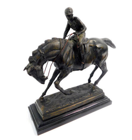 After Pierre Jules Mene (French 1810-1879). Horse and jockey, bronze, on a stepped rectangular marble base, 37cm wide, 34cm high.