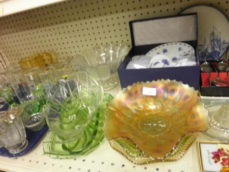 A Carnival glass bowl with a shaped edge