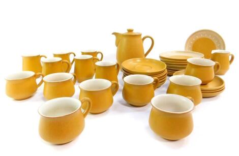 A Denby stoneware part coffee service decorated in the Ode pattern, comprising coffee pot, cream jug, sugar bowl, fourteen cups, nine saucers and eight plates.