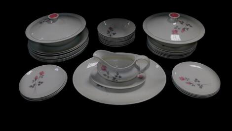 A Royal Doulton porcelain Pillar Rose part dinner service, comprising pair of vegetable tureens and covers, meat platter, sauce boat on stand, and plates.