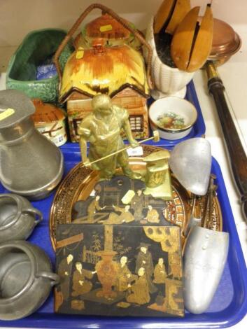 A Victorian papier mache letter rack decorated with oriental figures