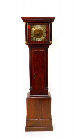 John Spinney, Blandford. A George III oak cased long case clock, square brass dial with foliate engraving, cherub spandrel, silvered chapter ring bearing Roman numerals, the movement with bell strike, the case hood with fluted columns, brass capped, trunk