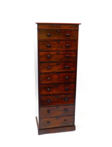 A Victorian rosewood narrow chest, of nine drawers, raised on a plinth base, 168cm high, 63cm wide, 46cm deep.