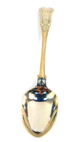 A Victorian silver serving spoon, decorated in the Kings pattern, crest engraved, Chawner & Company, London 1854, 6.98oz.