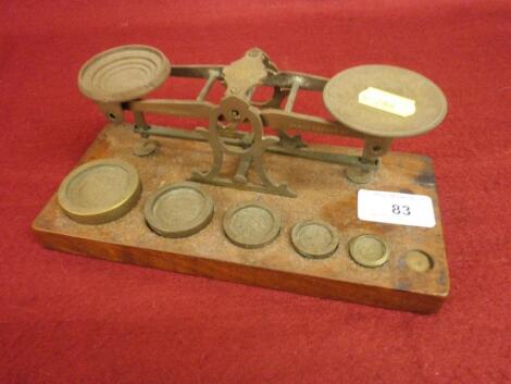 A set of Victorian brass and mahogany postal scales