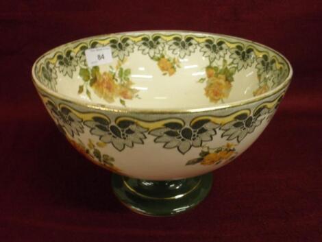 A Royal Doulton pedestal bowl decorated with the underglaze indestructible