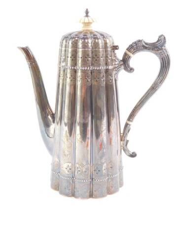 A Victorian silver coffee pot, of fluted outset form, engraved with bands of repeating flower heads, with ivory finial, number 53116, Walker & Hall, Sheffield 1895, 25.83oz, 27cm high.