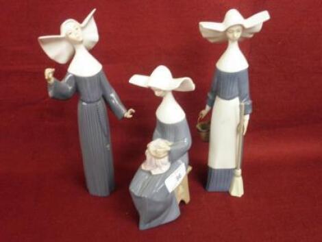 Three Lladro porcelain figures of nuns