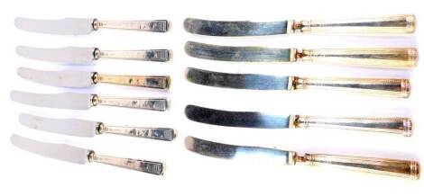 Six George VI silver handled fruit knives, Sheffield 1936, and five further silver handled fruit knives, Sheffield 1942.