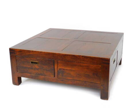 A square hardwood coffee table, with frieze drawers to each left side, raised on block feet, 42cm high, 100cm diameter.