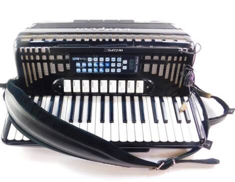 A Corelli Universal bass accordion, MICR Vox, with Musictech Music Maker, 120 bass.