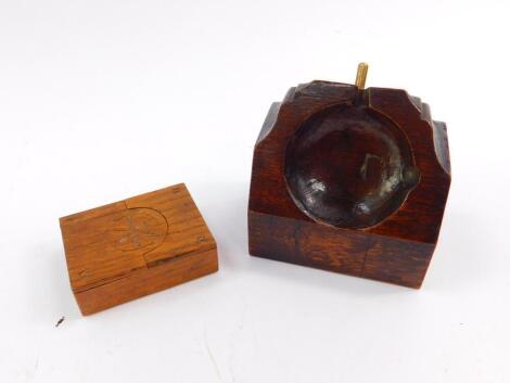 An oak pocket watch holder, 9cm wide, and a travelling pocket watch holder, 6.5cm wide. (2)