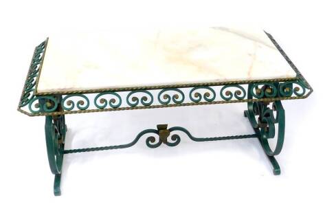 A green and gilt painted cast iron occasional table, with a rectangular white marble top, raised on scrolling end supports united by a shaped stretcher, 105cm wide, 58cm deep, 47cm high.