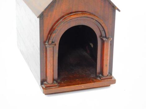 A Victorian mahogany dog kennel, of chapel form, 27cm wide, 45cm deep, 44cm high.