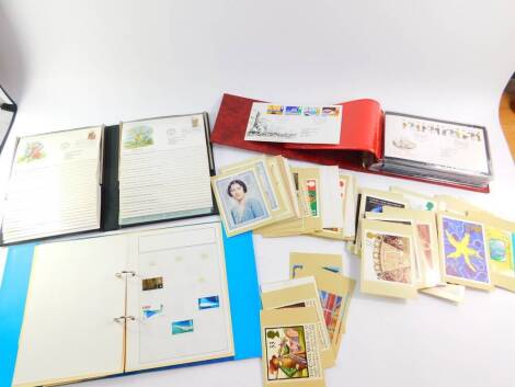 A 1981-1985 Ace Apollo 80 loose leaf stamp album, and Royal Mail Postage Stamp postcards. (a quantity)