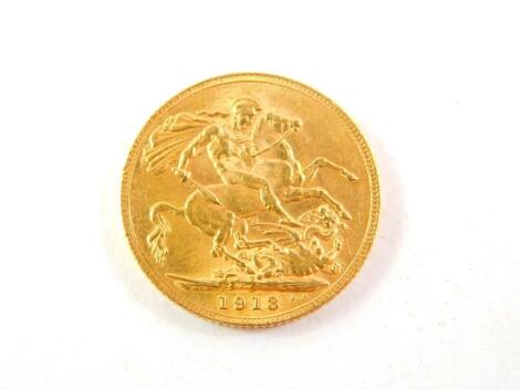 A George V full gold sovereign 1913.