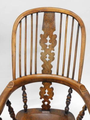 A near pair of 19thC yew, ash and elm Windsor chairs, each with a high back, a burr yew pierced splat, and turned spindles, the shaped bow with turned supports, solid seat on turned tapering legs with H stretcher. - 3