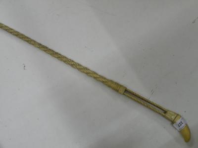 A 19thC carved Narwhal and marine ivory walking stick decorated