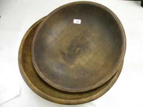 Two 19thC fruitwood turned wooden bowls