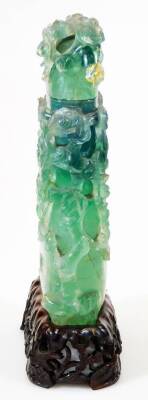 A Chinese green quartz vase and cover, heavily carved with flower heads, on a carved wood base, 19thC, 23cm high. - 5