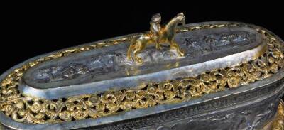 A highly elaborate Indian ceremonial freedom casket, of oval form, with horse and rider knop, flanked by lion mask handles, with a pierced arrangement of flower heads and scrolls, centred by a further arrangement of trees and buildings, on a shaped repeat - 6