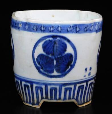 A lobed Japanese porcelain orchid pot, decorated with the Aoi mon of the Tokugawa family between key fret borders, signed illegibly to the side, 12.7cm high. - 4