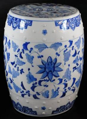 A 20thC Chinese blue and white porcelain barrel seat, of cylindrical form, decorated with a raised orb studding and with a repeat leaf decoration, 47cm high. - 2