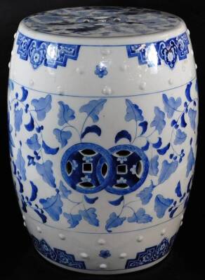 A 20thC Chinese blue and white porcelain barrel seat, of cylindrical form, decorated with a raised orb studding and with a repeat leaf decoration, 47cm high. - 3