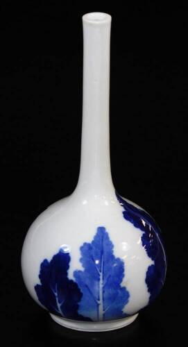 A Japanese Hirado porcelain bottle vase, decorated with stylised trees, Meiji period, wood box, 21.5cm high.