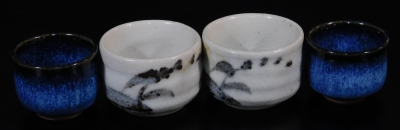 A pair of Japanese porcelain vases, each decorated with flowering shrubs on a white ground, marked JGC, similar cups, similar bowls, and a collection of other Oriental ceramics, blue and white tea bowls, etc. (a quantity) - 12