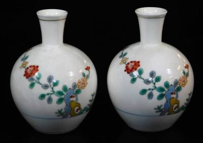 A pair of Japanese porcelain vases, each decorated with flowering shrubs on a white ground, marked JGC, similar cups, similar bowls, and a collection of other Oriental ceramics, blue and white tea bowls, etc. (a quantity) - 16