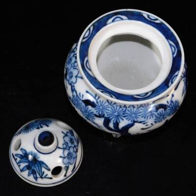 A pair of Japanese porcelain vases, each decorated with flowering shrubs on a white ground, marked JGC, similar cups, similar bowls, and a collection of other Oriental ceramics, blue and white tea bowls, etc. (a quantity) - 20