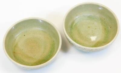 A pair of 2000 Thailand celadon bowls, each of flower head form, impressed marks beneath, 13cm wide, a further pair of celadon bowls textured with flowers of circular form and a further celadon bowl raised with figures, a Thai style double gourd vase, Jap - 15