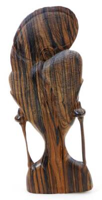 A heavily carved African tribal tiger wood head, with elaborate floral headdress, unsigned, 33cm high. - 3