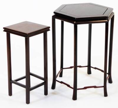 A Japanese hexagonal hardwood stand, with tapered splayed legs, 23cm high, and another square hardwood stand, mid 20thC, 19.8cm high.